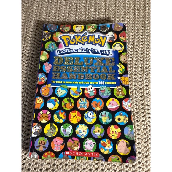 Pokémon Deluxe Essential Handbook Guide With Stats & Facts On Over 700 Pokémon - Picture 1 of 3